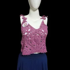 A delicate and lacy crochet top in a lovely mauve color. I used an intricate floral medallion pattern for the body and added adjustable tie-up straps for a perfect fit.