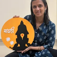 This 'Mauli' wall piece, featuring the silhouette of Lord Vitthal, was part of a custom set sent to the UK. The vibrant yellow and black design is both traditional and modern.