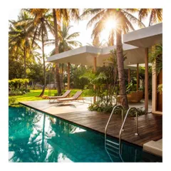 For this private residence, the goal was to create a tranquil oasis. The design seamlessly integrates the swimming pool and deck with the surrounding palm grove, using clean lines and natural materials to craft a space for quiet relaxation.