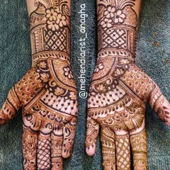 A classic Indian sider mehendi design. This style is perfect for guests or for brides who prefer a less dense pattern, focusing on one side of the hand.