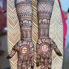 A creative design featuring the couple's names combined into a single logo on one palm, and a personal quote on the other, making it truly unique.