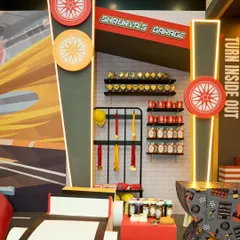 The "Shaurya's Garage" corner featured shelves stocked with custom-labeled props like trophies, medals, and racing gear, adding authenticity to the theme.