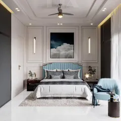 In this contemporary bedroom, I used classic wall molding and a serene blue color palette to create a sense of calm luxury. The vertical sconces and full-height built-in wardrobes add a modern, functional touch to the elegant design.