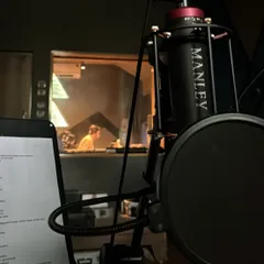 A view from the vocal booth. This is where the magic happens during a professional recording session. I can guide you through your vocal takes or record them myself to ensure a high-quality, polished sound.