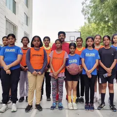 Our girls' team stands together after a practice session. We are proud to foster an inclusive environment where all players can sharpen their skills and build team chemistry.