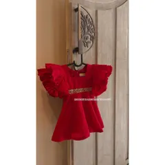 For the little trendsetter in your life, we created this vibrant red velvet party dress. It features dramatic ruffled sleeves and a delicate, hand-embellished waistband, making it a perfect outfit for birthdays, weddings, and special celebrations.