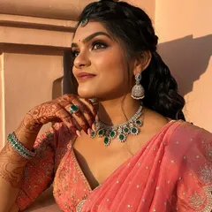 A close-up of the intricate hand embroidery on the blouse and the beautiful drape of the dupatta. Every detail is designed to make you feel special.
