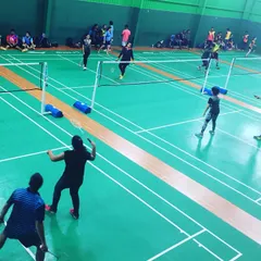 A wide shot of the Arcadis corporate tournament in full swing. With all five courts active, I can manage large-scale events efficiently, keeping the energy high and the games moving.