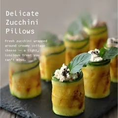 Delicate Zucchini Pillows, featuring fresh zucchini wrapped around creamy cottage cheese. This is a light, luscious, and healthy appetizer that is both refreshing and sophisticated, perfect for any occasion.