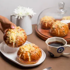 You have to try my signature Korean Cream Cheese Buns. They are fluffy, savory, and filled with a garlic cream cheese that is absolutely addictive. These are always the first to disappear at any party.