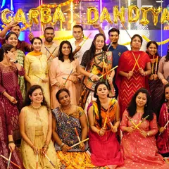 The whole crew together after a fun-filled Garba and Dandiya session. We love bringing people together through dance for wedding celebrations.