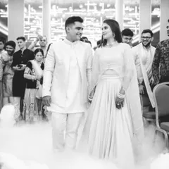 Making a grand entrance is a key part of any engagement party. I use techniques like this dry ice effect to create a dramatic, black and white photograph that feels like a still from a classic film.