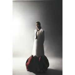 A full-length view of the sculptural dress from the Sigma test shoot. This demonstrates how the 30mm focal length works for capturing both the garment and the model's presence.