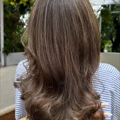 The final result of the color refresh and cut, looking vibrant and full of life.