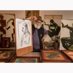 An environmental portrait of the legendary artist Jatin Das in his studio, surrounded by his work. This session highlights my approach to capturing professionals within their creative spaces, telling their story through their environment.