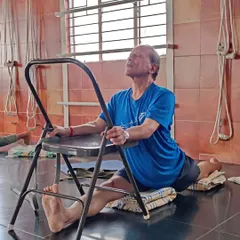 Here I am demonstrating Hanumanasana (splits) with the support of a chair and blankets. Props allow the body to ease into the full expression of the pose with correct alignment.