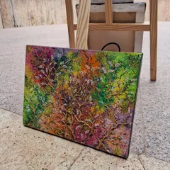 This vibrant, textured tree painting is an example of what you can create in our workshops. We guide you through techniques to build layers and use color, helping you produce a finished piece ready to display.