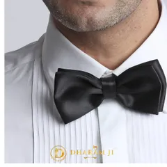 The classic black bow tie. It's the essential finishing touch for any tuxedo, and I ensure it's perfectly crafted.