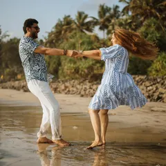 Pre-wedding shoots should also be about fun. I encourage my couples to let loose, laugh, and just be themselves. This shot, filled with movement and joy on the beach, perfectly captures that carefree spirit.