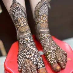 Another angle of the detailed bridal feet mehndi, showing the beautiful floral and geometric work.