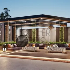 A view of the pergola-covered seating area on the party terrace. The space is furnished with comfortable, modern outdoor sofas and a hanging swing chair, perfect for lounging.