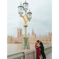 Love stories deserve a grand stage. Here, against the iconic backdrop of London's architecture, Akhil and Merlin share a kiss. This is an example of a destination couple shoot where we use the soul of a city to tell the story of two hearts becoming one.