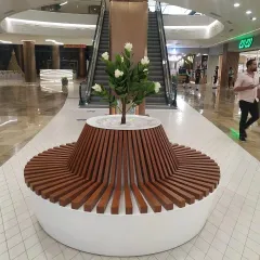 I love creating functional art, like this custom circular bench with an integrated planter at Lulu Hypermarket. It provides seating for shoppers while seamlessly incorporating a beautiful artificial flowering tree, making it a natural centerpiece for the corridor.