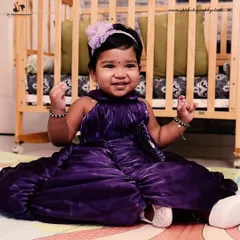 Our RR Nagar studio is equipped with various props, including this classic wooden crib, to create a charming and safe setting for your baby's photoshoot.