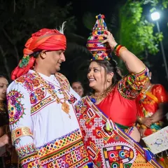 A vibrant and happy couple in traditional Gujarati attire for a festive event. I created a fresh and glowing makeup look for her that lasted all night.