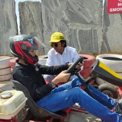 One on one coaching is a core part of our training philosophy. We take the time to sit with each new driver, explaining the controls and ensuring they feel secure before their first session on the track.