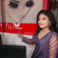 The completed engagement look, showcasing a happy client ready for her special event. Her radiant makeup and soft curls create a fresh and celebratory feel.