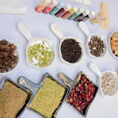 It's all in the details. A closer look at the beautiful array of fragrances, colors, and botanicals available for guests to create their custom candles. I source high-quality materials to elevate any interactive experience.