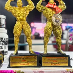 The hardware speaks for itself. First place in Mr. Asia Bodybuilding and third place in Classic Physique. These trophies represent the culmination of a perfect prep.