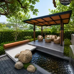 We design spaces for tranquility. This freestanding garden gazebo, set beside a custom water feature, creates a serene escape. The design integrates natural elements with a durable, modern structure, perfect for a Zen garden or poolside lounge.