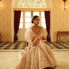 For this brand campaign, I captured the grandeur of heritage fashion in a palatial setting. The composition uses architectural symmetry and soft, natural light to frame the subject, highlighting the luxury of the ensemble.