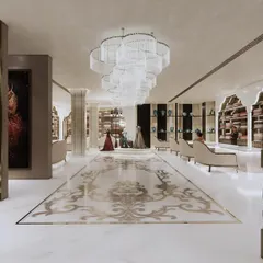 The main floor of the Frontier Bazaar bridal store in Ludhiana, where French Classical elegance meets Indian grandeur. The design features a grand open floor with intricate marble inlay, bespoke railings, and layered crystal chandeliers to create a world-class shopping experience.