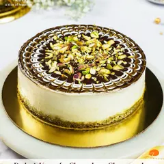 A taste of Dubai with a chocolatey twist. Our Dubai Kunafa Chocolate Cheesecake is a rich fusion of creamy cheesecake, crunchy kunafa, and luscious chocolate, topped with pistachios.