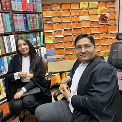 With my brother at Mohan Law House, one of our favorite bookstores. We learned from our seniors the importance of reading judgments and building a repository of case law to support our practice.