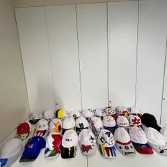 A colorful collection of hand-painted caps from my workshop with HBC. Each one is a small canvas showcasing big creativity.