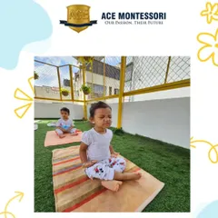 Even our youngest campers participate in yoga. This little one is practicing a seated meditation pose, learning to find a moment of quiet.