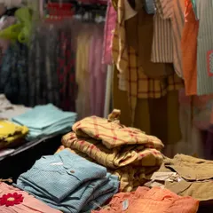 I handpick every brand to ensure you find beautiful, high-quality items, like this colorful collection of children's apparel. You'll discover unique textures and prints from local designers, perfect for adding something special to your child's wardrobe.