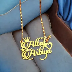Perfect for couples, this custom pendant displays two names in a beautiful script, accented with a crown and a heart. The gold-plated finish gives it a rich and celebratory look.