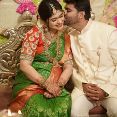 A candid, joyful moment between a couple during their traditional baby shower ceremony. Capturing genuine emotion is at the heart of what I do, preserving these fleeting feelings forever.