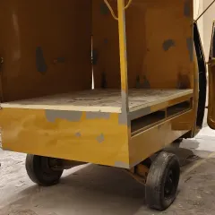 The blank canvas. This is the auto-rickshaw as we received it, a plain yellow vehicle waiting for its story to be told. We saw not just a machine, but a future landmark for the space.