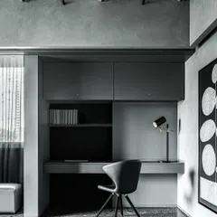 The master study in the Vaulted Haus is a compact, functional space hidden behind large sliding panels. The built-in desk and shelving are rendered in a monochrome palette, consistent with the apartment's overall aesthetic.