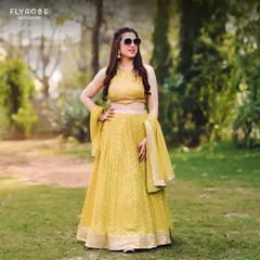 Posing with confidence, she looks absolutely radiant in her rented yellow Haldi lehenga. This is what smart, sustainable, and stylish celebration looks like.