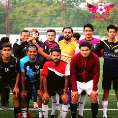 A proud team poses with their hard-earned trophy. These moments of collective achievement are what build lasting bonds between players.
