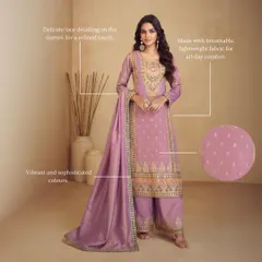 This elegant palazzo set is crafted from a silk-touch fabric. The kurta has delicate prints and neck detailing, paired with coordinating palazzo pants for a comfortable yet sophisticated look.