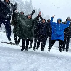 The whole group jumping for joy in the snow. The energy and excitement of a winter trek are contagious, and we love sharing these happy moments with our Musafir family.