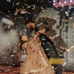 A fairytale moment for the couple during their Sangeet, captured in a romantic dip amidst a shower of confetti. I design these magical moments that become the highlight of your celebration.
